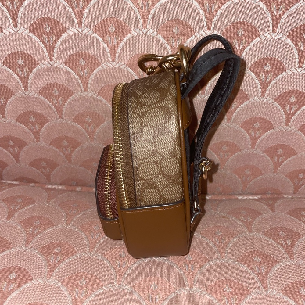 Mini Court Backpack Bag Charm In Signature Canvas.   New condition ,